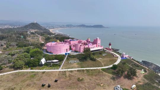 航拍福建漳州火山岛度假旅游区粉红城堡