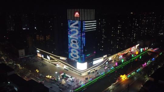 高楼大厦亮化飞向城市远景视频素材模板下载