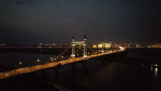 4K航拍哈尔滨阳明滩大桥城市夜景地标建筑
