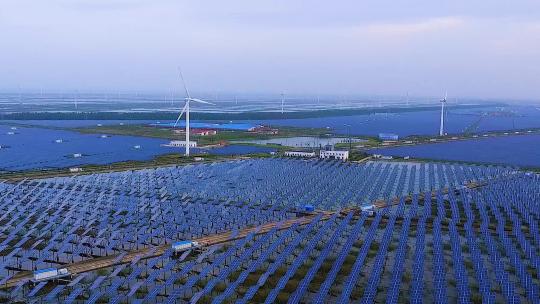 航拍新能源太阳能与风能发电组合