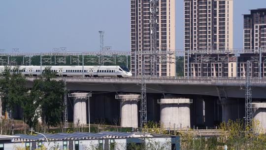 行驶中的高铁列车中国铁路和谐号铁路高架视频素材模板下载