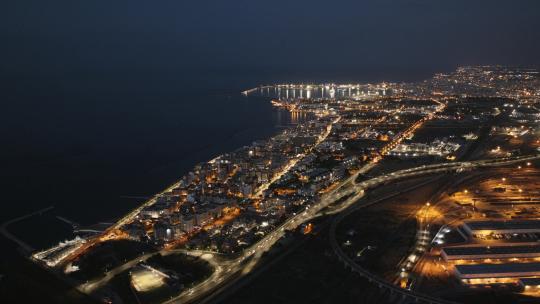 夜晚海滨城市璀璨灯光夜景航拍