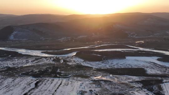 航拍内蒙古冰消雪融原野大地