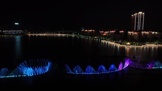 航拍鄂州夜景水上激光音乐五彩喷泉