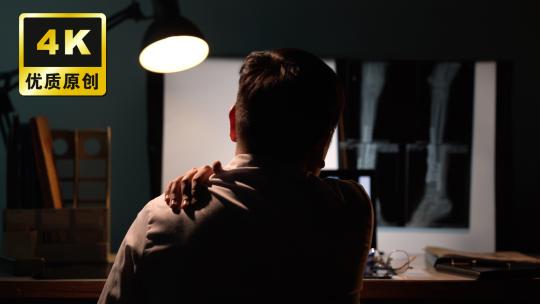 医生夜晚疲惫工作病情分析治病救人医者仁心