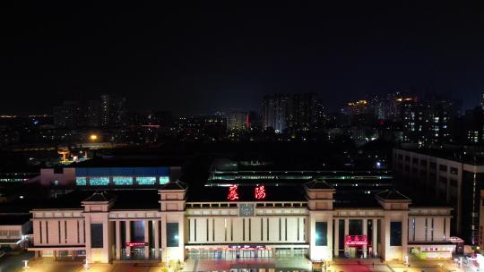 航拍湖北襄阳火车站襄阳站夜景视频素材模板下载