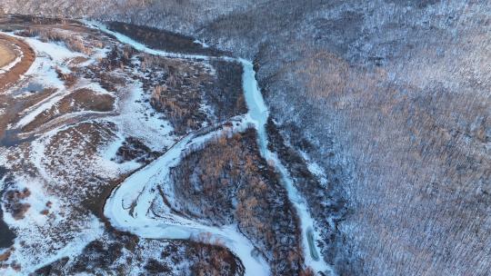 航拍呼伦贝尔早春冰雪山林河湾