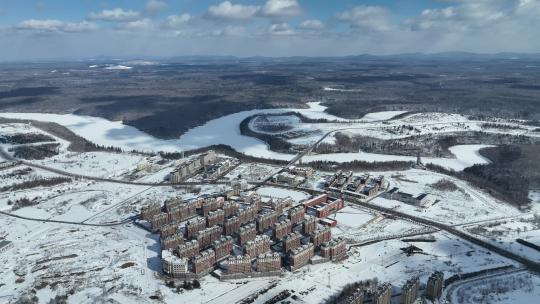 白山市抚松县城市建筑航拍冬季雪原风光