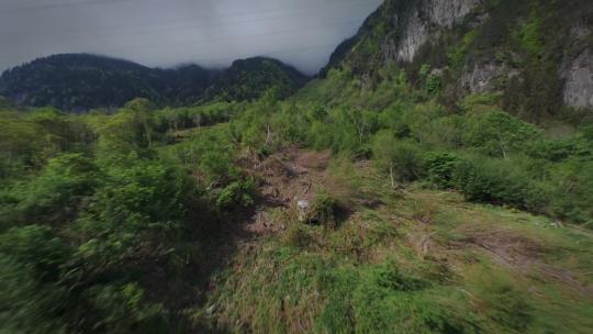 穿越机飞越群山峡谷山脊森林视频素材模板下载