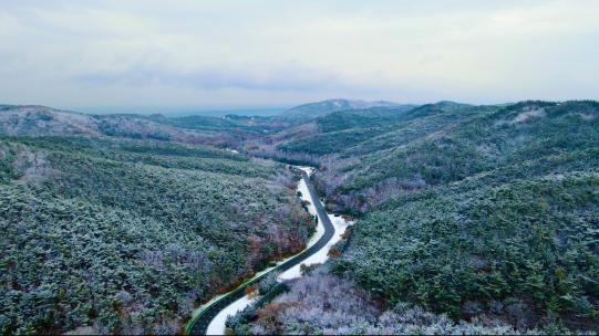 雪后初停航拍迎宾路至棒锤岛北门