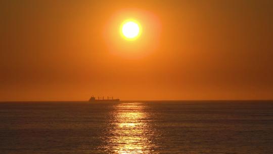 4K航拍夕阳海面货轮