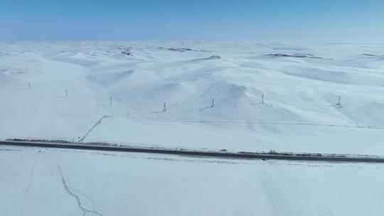 内蒙古呼伦贝尔雪原公路自然风光航拍视频素材模板下载