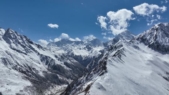 西藏日喀则市吉隆县夏村纯净雪山航拍空境