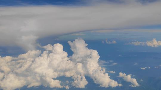 航空业飞机窗外漂浮的云景视频素材模板下载