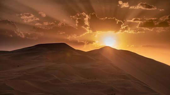沙漠日落夕阳太阳光茫延时自然风光