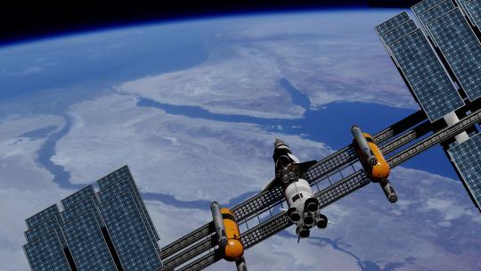 扩展太阳能电池板阵列的宇宙飞船绕地球运行视频素材模板下载