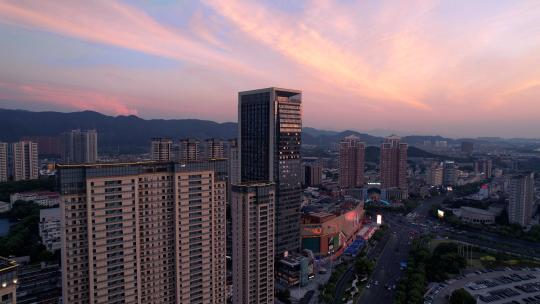 义乌吾悦广场城市晚霞建筑风光航拍高清在线视频素材下载