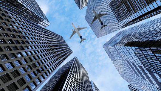 4k大气飞机飞过城市金融楼顶视频素材模板下载