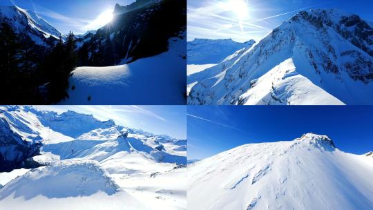 FPV航拍巍峨的山峰雪山山顶高山脉山脊视频素材模板下载