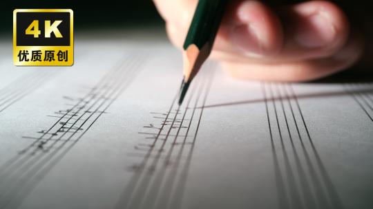 创作音乐手写五线谱特写写音符音乐家作曲视频素材模板下载