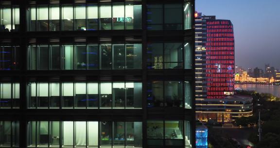 现代城市玻璃幕墙写字楼办公室夜景