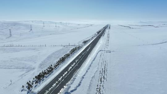 内蒙古呼伦贝尔雪原公路自然风光航拍视频素材模板下载
