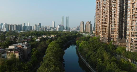 航拍成都高楼住宅下的河滨别墅区风景