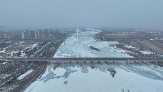 吉林珲春市森林山大桥航拍城市冬季风光