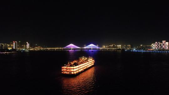 航拍武汉夜晚长江上航行的游船轮渡知音号视频素材模板下载