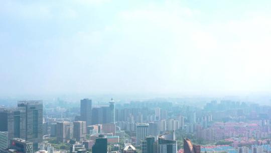 在朦胧云雾中的上海陆家嘴地标建筑航拍