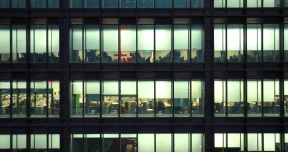 现代城市玻璃幕墙写字楼办公室夜景