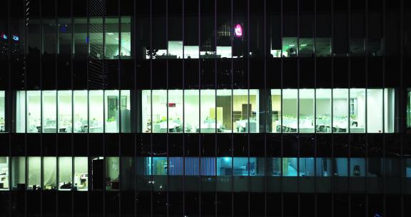 现代城市玻璃幕墙写字楼办公室夜景
