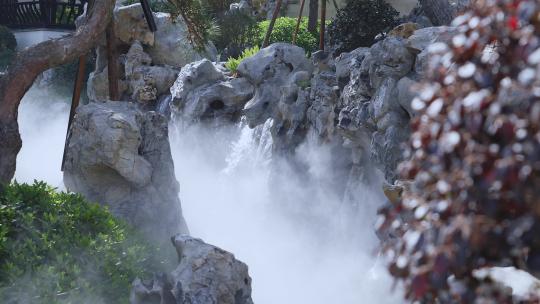 传统中式园林公园内太湖石假山流水瀑布