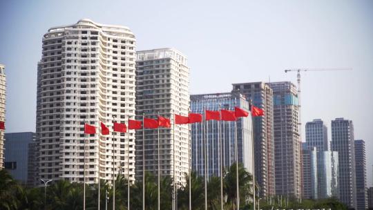 海南国际会议展览中心红旗风中飘扬视频素材模板下载