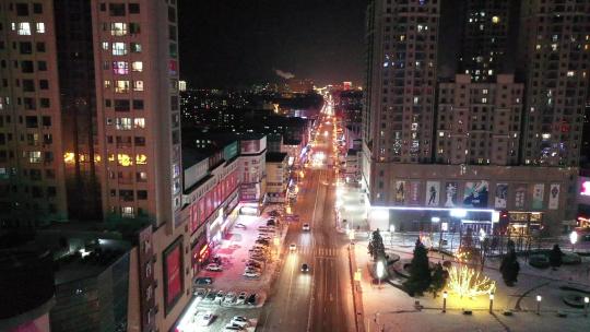 雪后城市霓虹夜景航拍视频素材模板下载