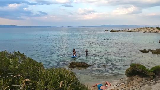 希腊哈尔基迪基Halkidiki海滩海边划船拍照视频素材模板下载