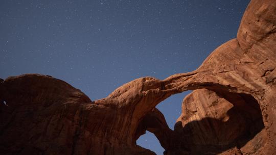 拱门国家公园双拱门后面夜空的时间流逝视频素材模板下载