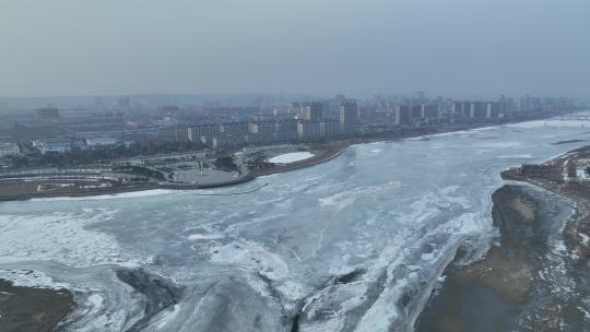 吉林珲春市冬季珲春河城市风光航拍视频素材模板下载
