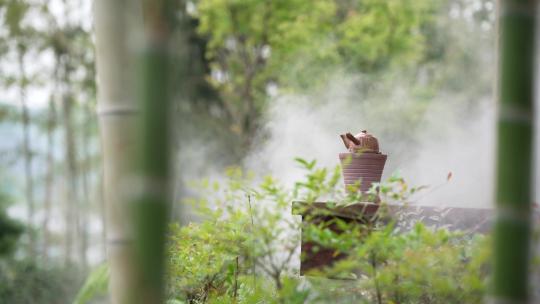 竹林中复古碳炉水壶围炉煮茶视频素材模板下载