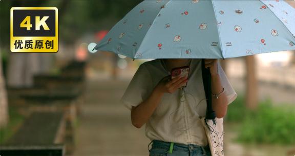 雨天行人马路行人打伞 下雨天街道走路