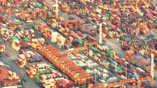 航拍城市货运出口码头堆积如山的彩色集装箱