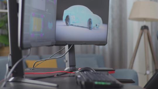 两台台式电脑的显示器正在家里的工作台上显示电动汽车的3D模型