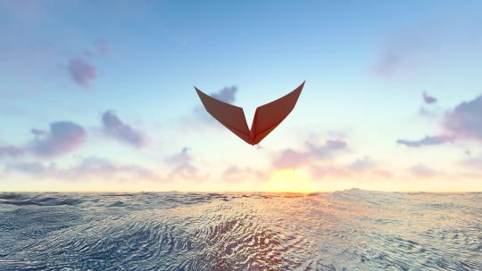 纸飞机迎着太阳穿越海平面奔向自由和远方