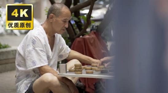 老年人下象棋退休生活社区活动老人公园下棋