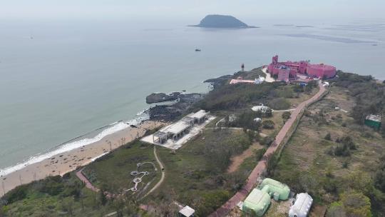 航拍福建漳州火山岛度假旅游区粉红城堡