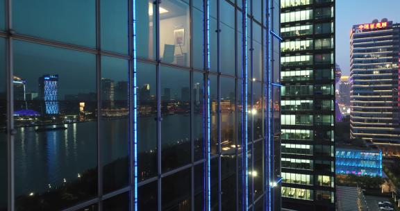 现代城市玻璃幕墙写字楼办公室夜景