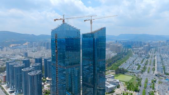 城市CBD商务写字楼建设施工昆明北京路航拍视频素材模板下载