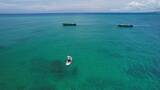 海南万宁山钦湾海边桨板航拍高清在线视频素材下载
