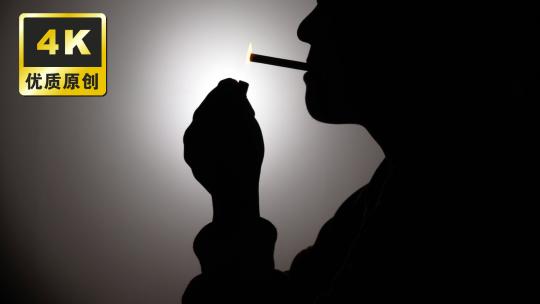 抽烟剪影 男人抽烟思考生活压力大吸烟有害