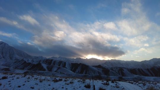 连绵群山雪景日落晚霞延时